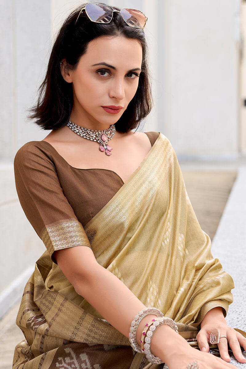 Quintessential Beige Soft Banarasi Silk Saree With Serendipity Blouse Piece