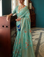 Intricate Firozi Soft Banarasi Silk Saree With Jazzy Blouse Piece