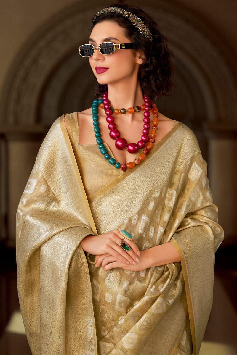 Resonant Beige Soft Banarasi Tissue Silk Saree With Imaginative Blouse Piece