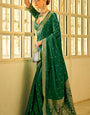 Flattering Dark Green Banarasi Satin Silk Saree With Demure Blouse Piece