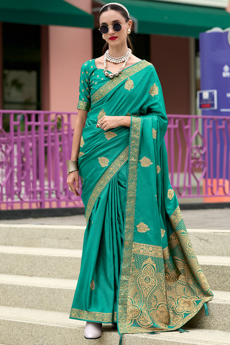 Staring Rama Soft Banarasi Silk Saree With Sensational Blouse Piece