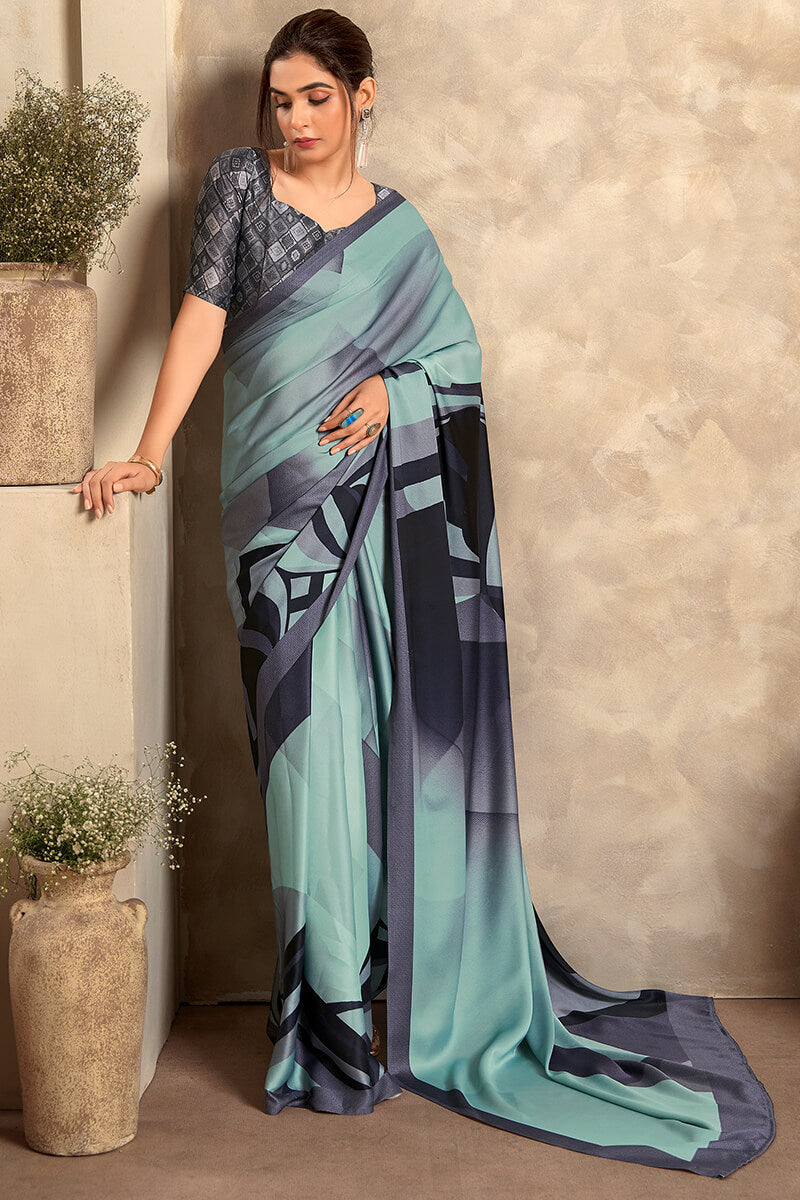 Engrossing Sky Digital Printed Satin Silk Saree With Groovy Blouse Piece