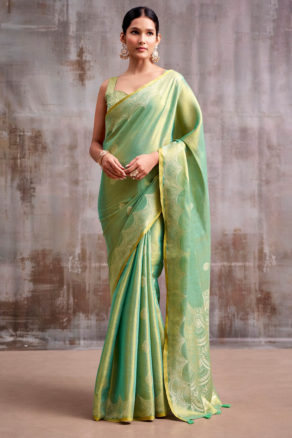 Demanding Sea Green Banarasi Tissue Silk Saree With Beauteous Blouse Piece