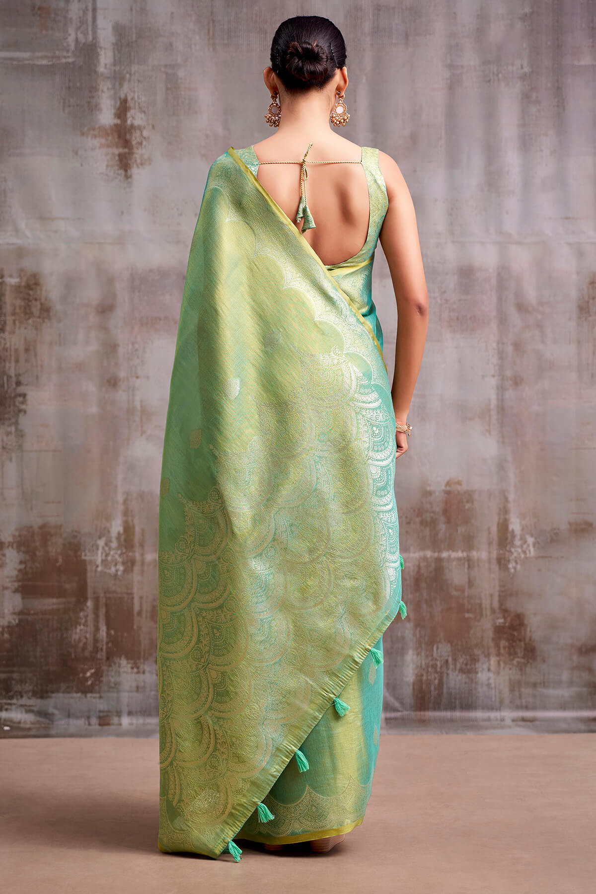 Demanding Sea Green Banarasi Tissue Silk Saree With Beauteous Blouse Piece