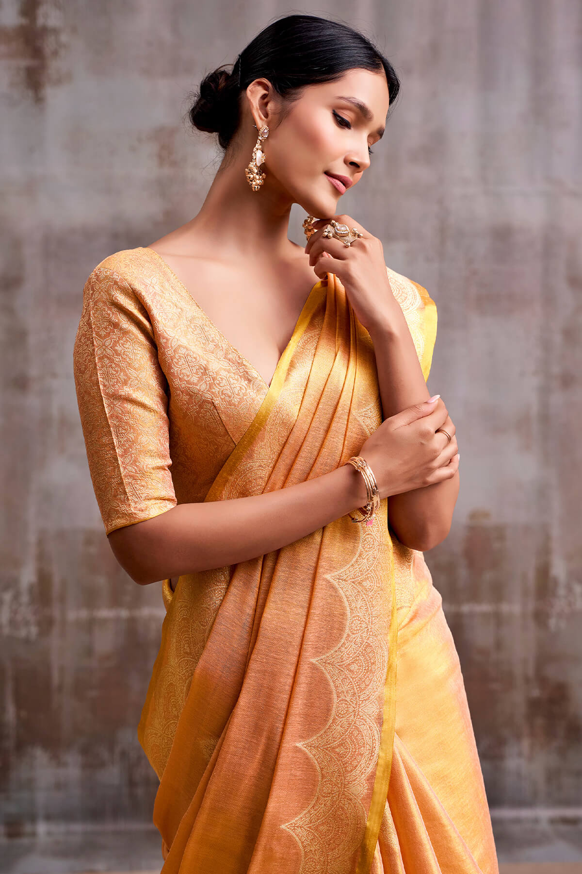 Luminous Peach Banarasi Tissue Silk Saree With Intricate Blouse Piece