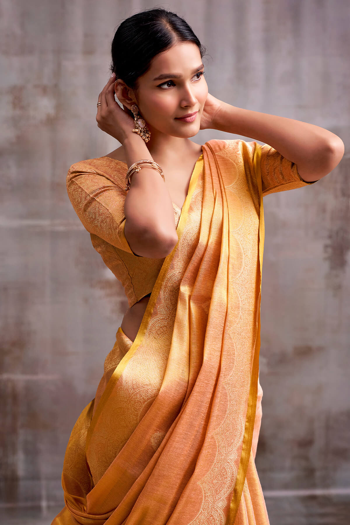 Luminous Peach Banarasi Tissue Silk Saree With Intricate Blouse Piece