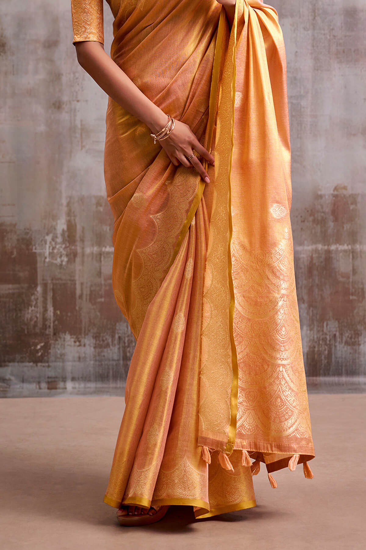 Luminous Peach Banarasi Tissue Silk Saree With Intricate Blouse Piece