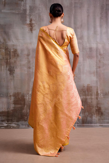 Luminous Peach Banarasi Tissue Silk Saree With Intricate Blouse Piece