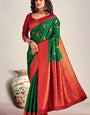 Fugacious Dark Green Soft Banarasi Silk Saree With Scintilla Blouse Piece