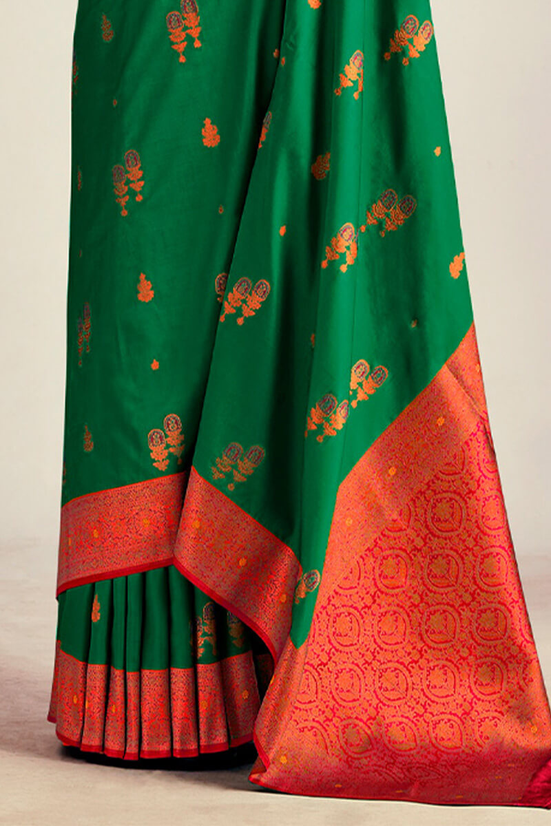 Lassitude Dark Green Soft Banarasi Silk Saree With Redolent Blouse Piece