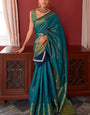 Ravishing Rama Kanjivaram Silk Saree With Flameboyant Blouse Piece