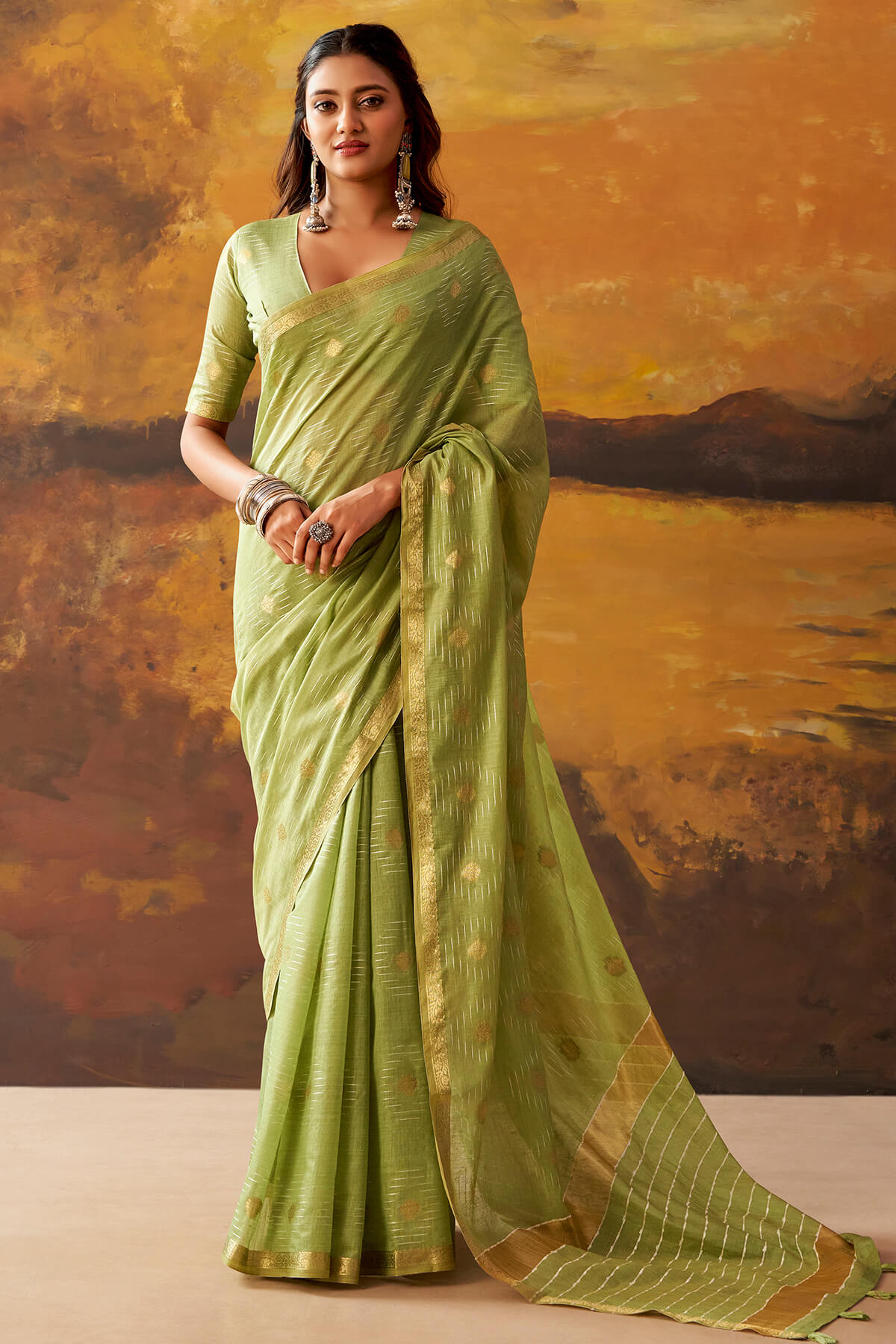 Delectable Green Cotton Silk Saree With Elaborate Blouse Piece