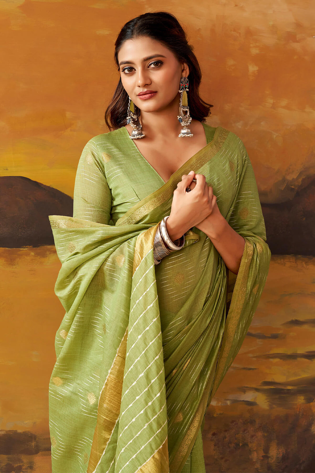 Delectable Green Cotton Silk Saree With Elaborate Blouse Piece