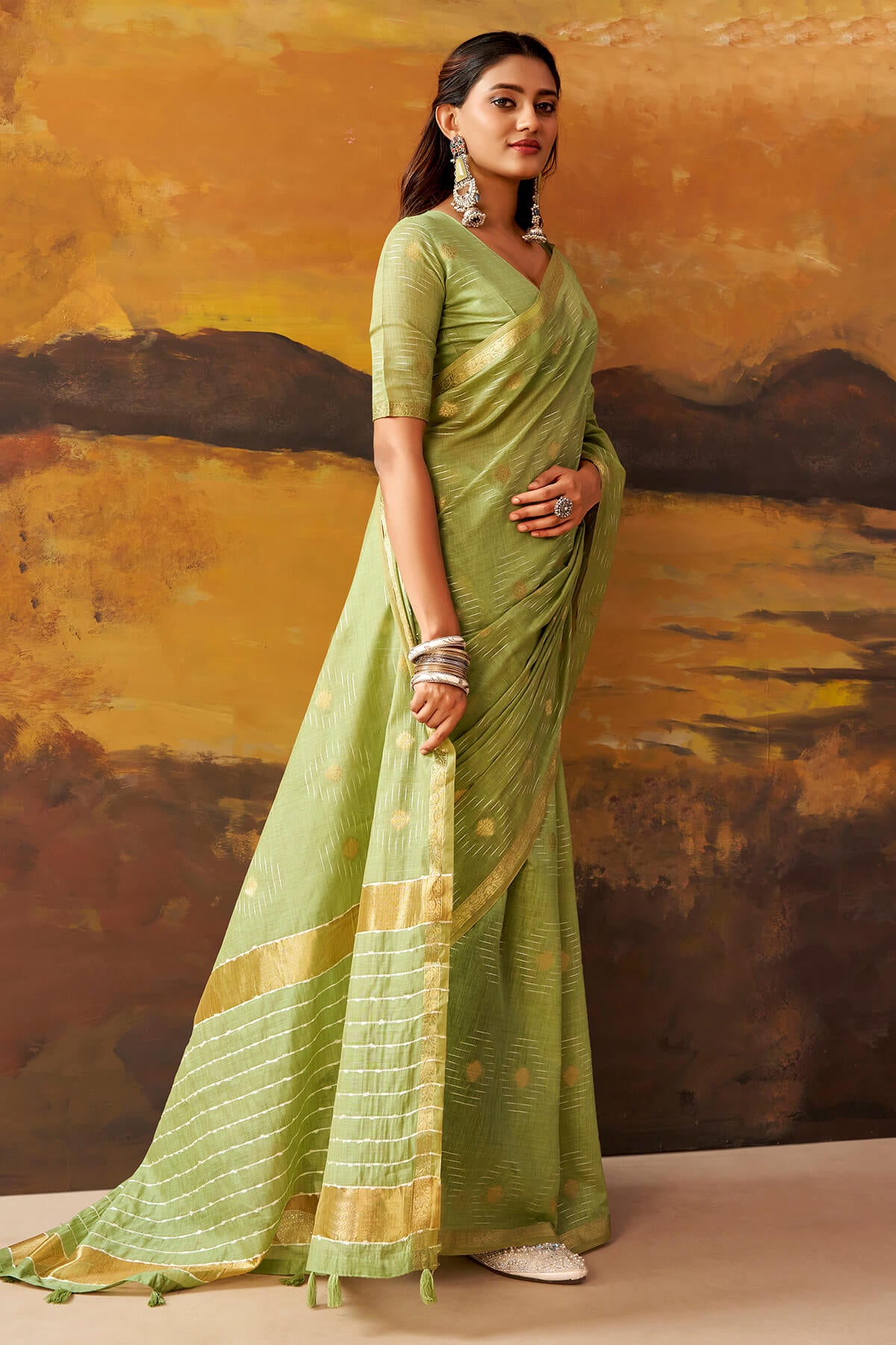 Delectable Green Cotton Silk Saree With Elaborate Blouse Piece