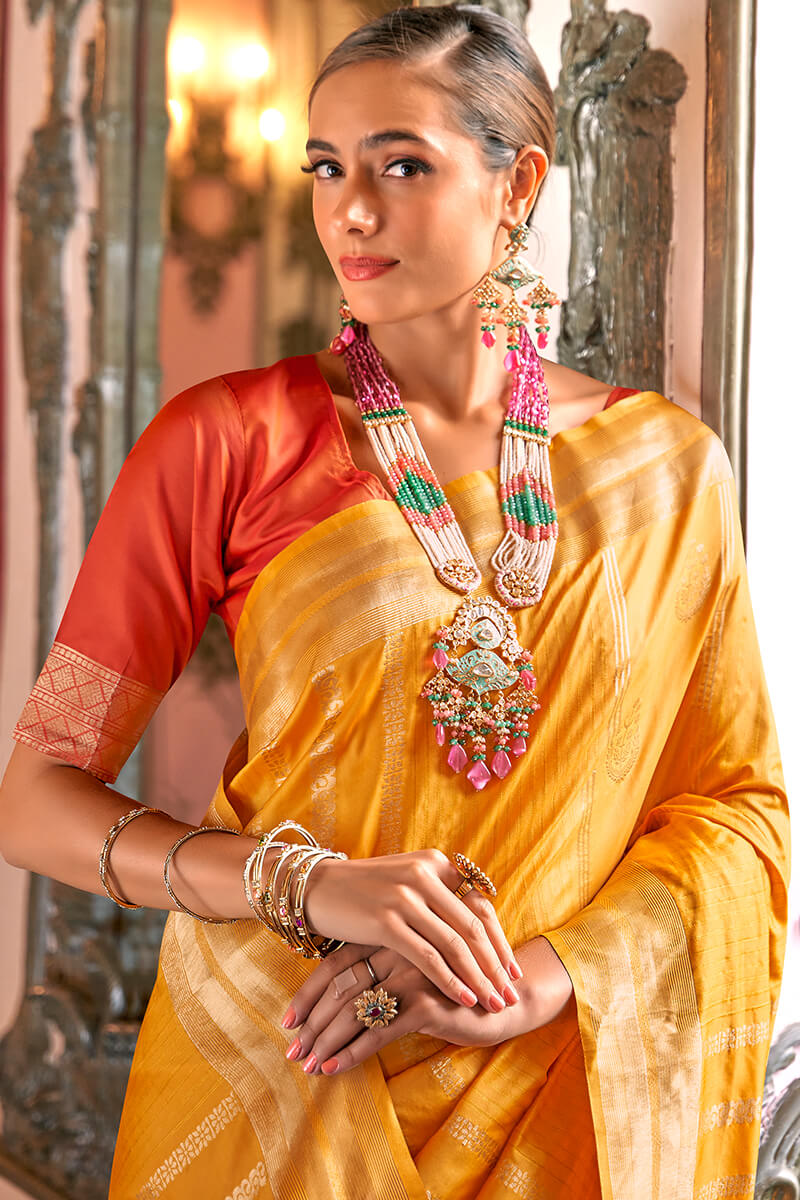 Diaphanous Yellow Soft Banarasi Silk Saree With Bewitching Blouse Piece