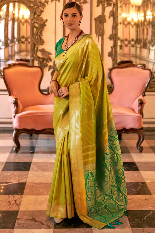 Load image into Gallery viewer, Surpassing Mehndi Soft Banarasi Silk Saree With Skinny Blouse Piece
