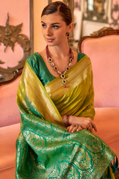 Load image into Gallery viewer, Surpassing Mehndi Soft Banarasi Silk Saree With Skinny Blouse Piece
