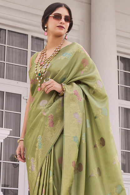 Lassitude Green Banarasi Tissue Silk Saree With Gratifying Blouse Piece
