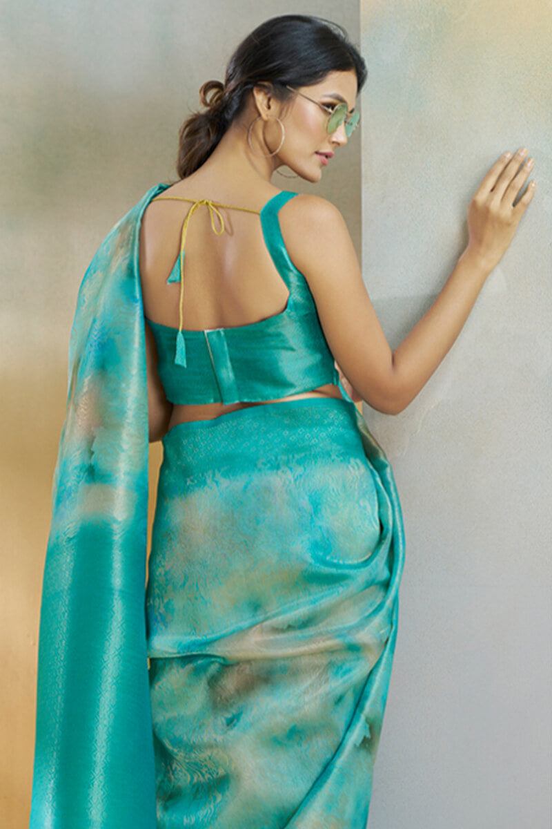 Beguiling Turquoise Digital Printed Soft Silk Saree With Alluring Blouse Piece