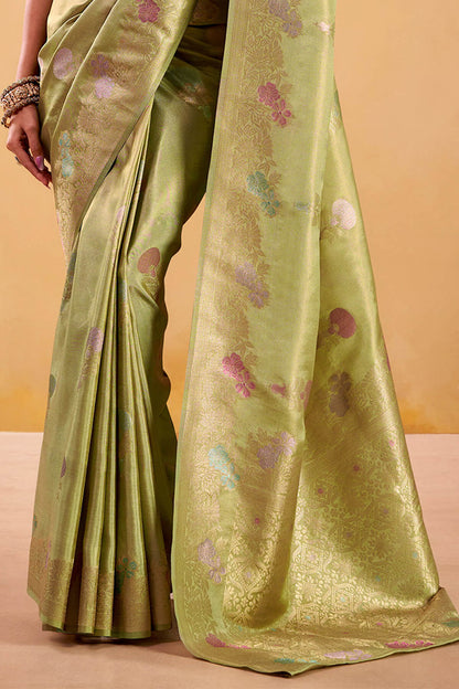 Snappy Green Banarasi Tissue Silk Saree With Eye-catching Blouse Piece