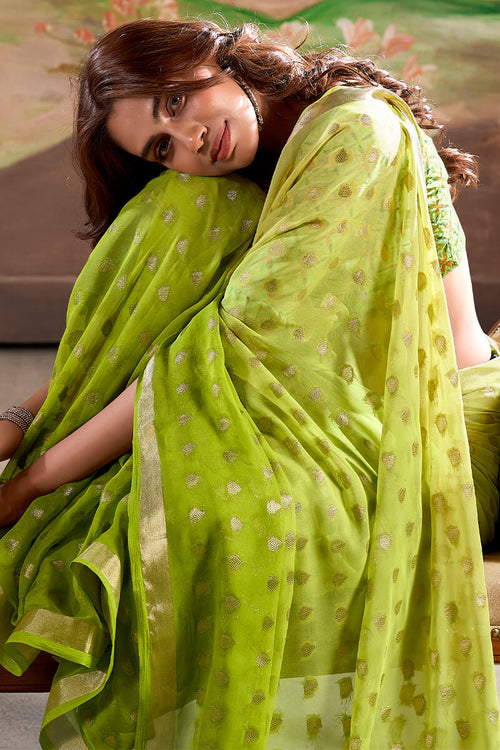 Load image into Gallery viewer, Extraordinary Parrot Georgette Banarasi Silk Saree With Gorgeous Blouse Piece
