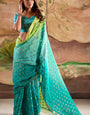 Adorable Sea Green Georgette Banarasi Silk Saree With Intricate Blouse Piece