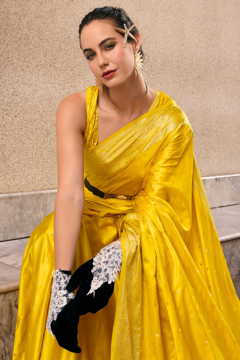 Adorning Yellow Banarasi Satin Silk Saree With Demanding Blouse