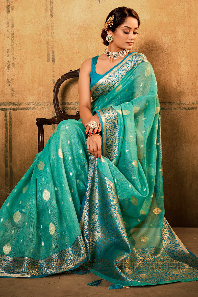 Outstanding Sea Green Soft Banarasi Silk Saree With Appealing Blouse Piece