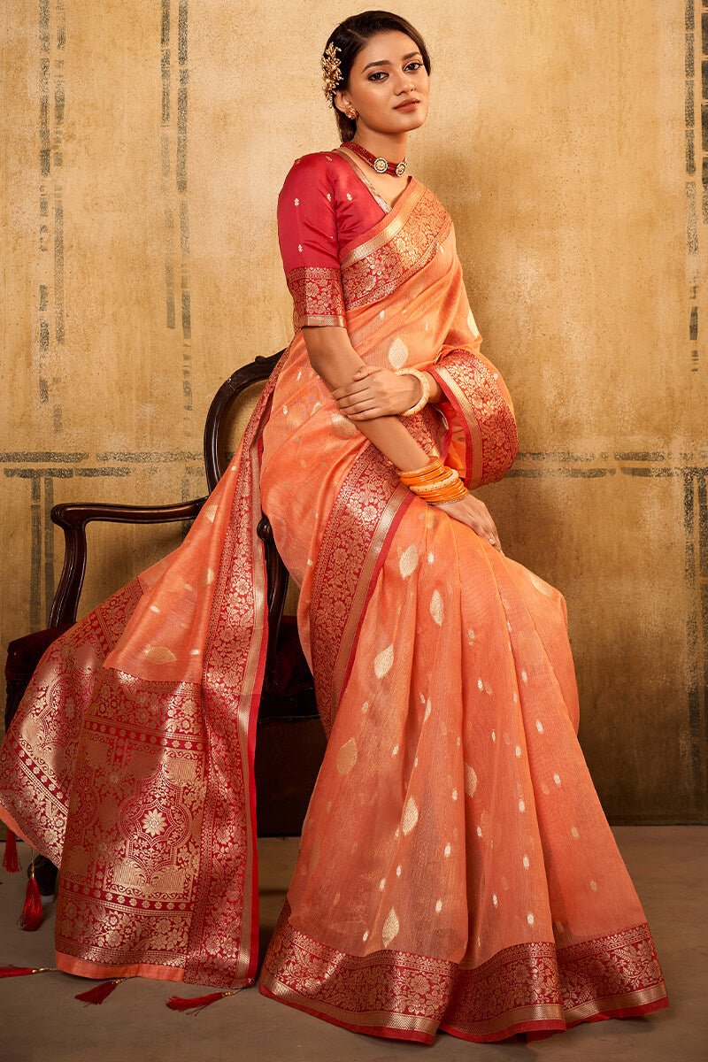 Flamboyant Peach Soft Banarasi Silk Saree With Exquisite Blouse Piece