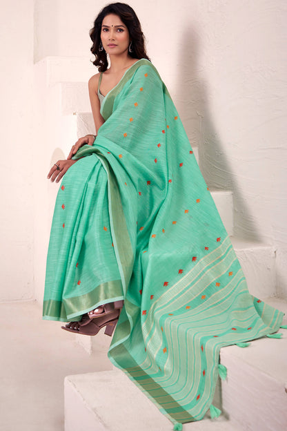 Dissemble Turquoise Cotton Silk Saree With Classy Blouse Piece