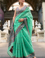 Cynosure Sea Green Cotton Silk Saree With Mellifluous Blouse Piece