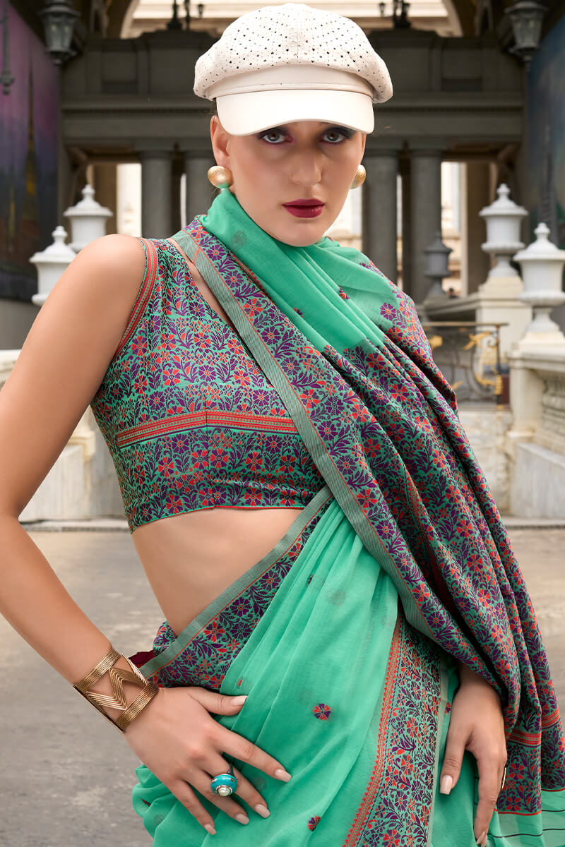 Cynosure Sea Green Cotton Silk Saree With Mellifluous Blouse Piece