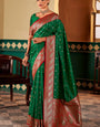 Alluring Dark Green Soft Banarasi Silk Saree With Zephyr Blouse Piece