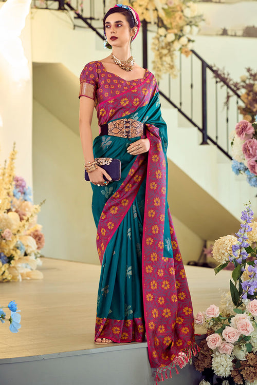 Load image into Gallery viewer, Surpassing Teal Blue Soft Banarasi Silk Saree With Adorning Blouse Piece
