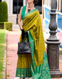 Scrumptious Mehndi Soft Banarasi Silk Saree With Splendorous Blouse Piece