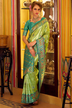 Elision Green Tissue Patola Silk Saree with Effulgent Blouse Piece