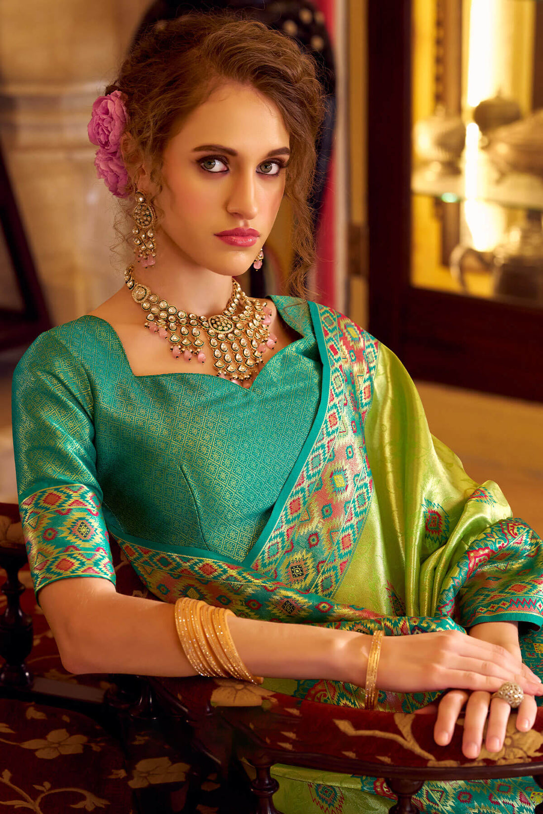 Elision Green Tissue Patola Silk Saree with Effulgent Blouse Piece