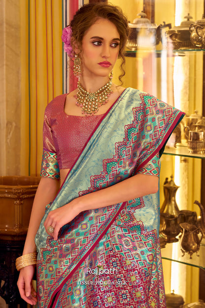 Ethnic Rama Tissue Patola Silk Saree with Enticing Blouse Piece