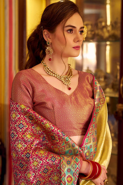 Fragrant Yellow Tissue Patola Silk Saree with Trendy Blouse Piece