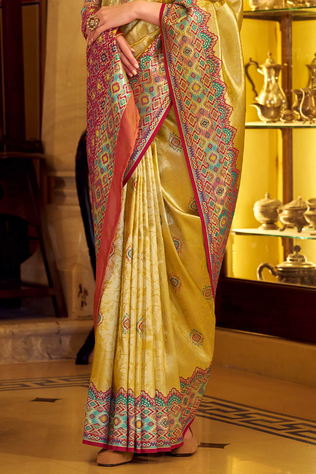 Fragrant Yellow Tissue Patola Silk Saree with Trendy Blouse Piece