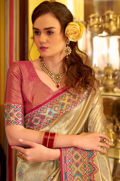 Conflate Beige Tissue Patola Silk Saree with Supernal Blouse Piece