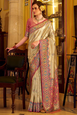 Conflate Beige Tissue Patola Silk Saree with Supernal Blouse Piece