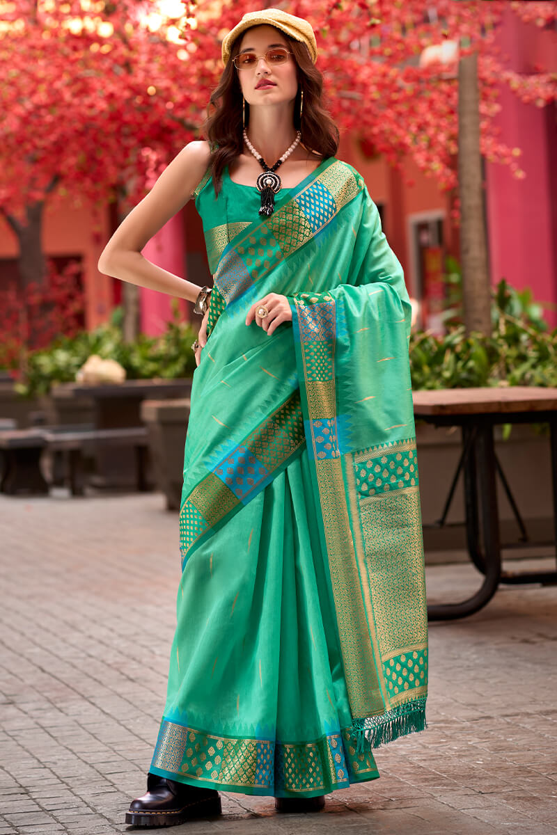 Capricious Sea Green Soft Banarasi Silk Saree With Charming Blouse Piece