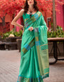 Capricious Sea Green Soft Banarasi Silk Saree With Charming Blouse Piece