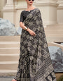 Cynosure Black Printed Mul Cotton Saree With Beleaguer Blouse Piece