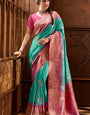 Angelic Firozi Soft Banarasi Silk Saree With Ailurophile Blouse Piece