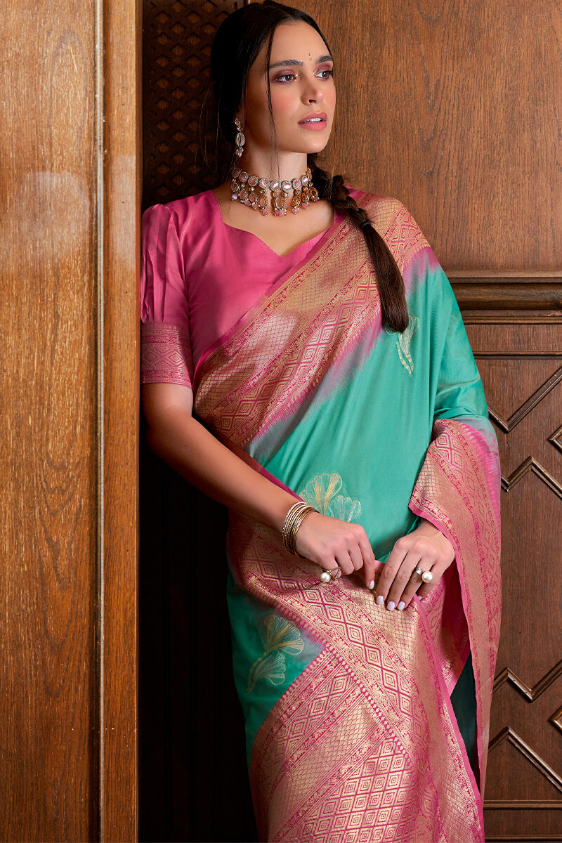 Angelic Firozi Soft Banarasi Silk Saree With Ailurophile Blouse Piece