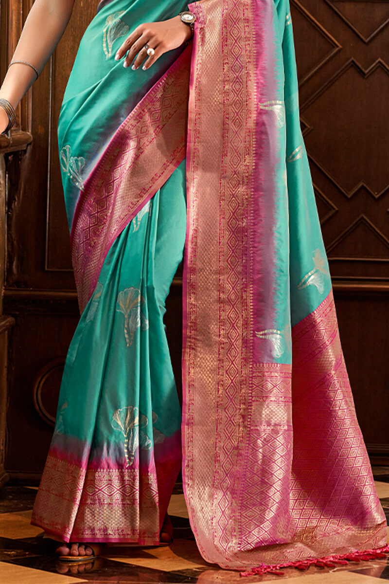 Angelic Firozi Soft Banarasi Silk Saree With Ailurophile Blouse Piece