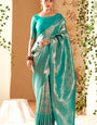 Sumptuous Firozi Kanjivaram Silk Saree With Amiable Blouse Piece