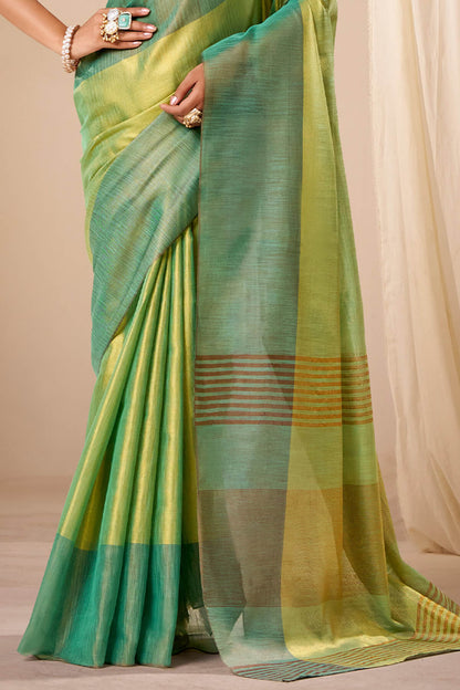 Murmurous Green Banarasi Tissue Silk Saree With Sonorous Blouse Piece